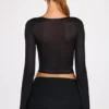 Liah Transparentes Jersey-Oberteil mit tiefem Ausschnitt und langen Ärmeln in Schwarz Liah Transparentes Jersey-Oberteil mit tiefem Ausschnitt und langen Ärmeln in Schwarz