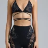Liberty Bikini-Oberteil mit verzierten Kreuzbändern in Schwarz