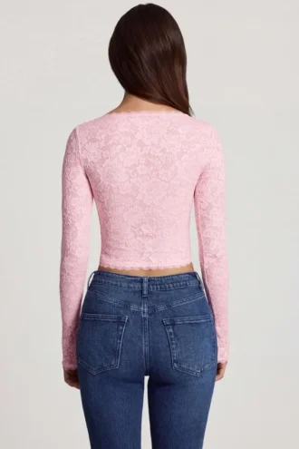 Lioren Transparentes Spitzen-Oberteil mit tiefem Ausschnitt und langen Ärmeln in Rosa