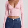 Lioren Transparentes Spitzen-Oberteil mit tiefem Ausschnitt und langen Ärmeln in Rosa Lioren Transparentes Spitzen-Oberteil mit tiefem Ausschnitt und langen Ärmeln in Rosa