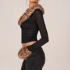 Lola Cardigan aus transparentem Mesh mit Kunstfellbesatz in Schwarz Lola Cardigan aus transparentem Mesh mit Kunstfellbesatz in Schwarz