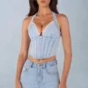 Lotta Neckholder-Oberteil im Denim-Korsett-Stil in hellem Denim Lotta Neckholder-Oberteil im Denim-Korsett-Stil in hellem Denim