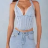 Lotta Neckholder-Oberteil im Denim-Korsett-Stil in hellem Denim Lotta Neckholder-Oberteil im Denim-Korsett-Stil in hellem Denim