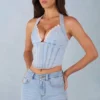 Lotta Neckholder-Oberteil im Denim-Korsett-Stil in hellem Denim Lotta Neckholder-Oberteil im Denim-Korsett-Stil in hellem Denim
