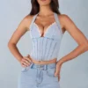 Lotta Neckholder-Oberteil im Denim-Korsett-Stil in hellem Denim Lotta Neckholder-Oberteil im Denim-Korsett-Stil in hellem Denim