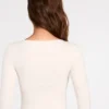 Luisa geripptes Modal-Oberteil mit Rüschen und langen Ärmeln in Elfenbein Luisa geripptes Modal-Oberteil mit Rüschen und langen Ärmeln in Elfenbein