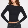 Luisa – Langärmliges, geripptes Modal-Oberteil mit Rüschen in Schwarz Luisa – Langärmliges, geripptes Modal-Oberteil mit Rüschen in Schwarz