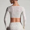 Lumina verziertes langärmeliges Crop-Top in Weiß Lumina verziertes langärmeliges Crop-Top in Weiß