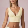 Magda Crop-Oberteil mit Schleifendetail in zitronengelben Streifen Magda Crop-Oberteil mit Schleifendetail in zitronengelben Streifen