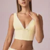 Magda Crop-Oberteil mit Schleifendetail in zitronengelben Streifen Magda Crop-Oberteil mit Schleifendetail in zitronengelben Streifen