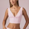 Magda Crop-Top mit Schleifendetail in zartem Mauve-Streifen Magda Crop-Top mit Schleifendetail in zartem Mauve-Streifen
