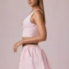 Maira geraffter Minirock mit Kordelzug in zartem Mauve gestreift Maira geraffter Minirock mit Kordelzug in zartem Mauve gestreift