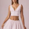Maira geraffter Minirock mit Kordelzug in zartem Mauve gestreift Maira geraffter Minirock mit Kordelzug in zartem Mauve gestreift