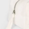Make-up-Tasche aus Cord mit Schleife in Elfenbein Make-up-Tasche aus Cord mit Schleife in Elfenbein