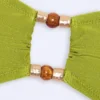 Manava Bandeau-Bikinioberteil mit Perlenverzierung in Olivgrün Manava Bandeau-Bikinioberteil mit Perlenverzierung in Olivgrün