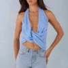 Maraya Deep Plunge Halterneck Oberteil mit blauem Polka-Dot-Print Maraya Deep Plunge Halterneck Oberteil mit blauem Polka-Dot-Print