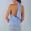 Maraya Deep Plunge Halterneck Oberteil mit blauem Polka-Dot-Print Maraya Deep Plunge Halterneck Oberteil mit blauem Polka-Dot-Print