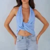 Maraya Deep Plunge Halterneck Oberteil mit blauem Polka-Dot-Print Maraya Deep Plunge Halterneck Oberteil mit blauem Polka-Dot-Print