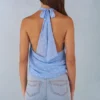 Maraya Deep Plunge Halterneck Oberteil mit blauem Polka-Dot-Print Maraya Deep Plunge Halterneck Oberteil mit blauem Polka-Dot-Print