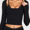 Margaux geripptes Modal-Langarm-BH-Oberteil mit Schnürung in Schwarz Margaux geripptes Modal-Langarm-BH-Oberteil mit Schnürung in Schwarz