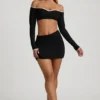 Mari Modal-Minirock mit asymmetrischem Bund in Schwarz Mari Modal-Minirock mit asymmetrischem Bund in Schwarz