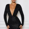 Marva Minikleid mit Cut-outs und Verzierungen in Schwarz Marva Minikleid mit Cut-outs und Verzierungen in Schwarz
