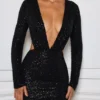Marva Minikleid mit Cut-outs und Verzierungen in Schwarz Marva Minikleid mit Cut-outs und Verzierungen in Schwarz