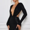 Marva Minikleid mit Cut-outs und Verzierungen in Schwarz Marva Minikleid mit Cut-outs und Verzierungen in Schwarz