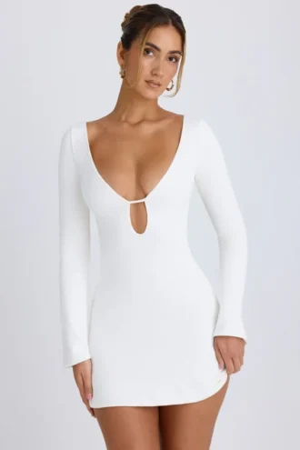 Mavisa Cut-Out-Minikleid mit langen Ärmeln in Weiß