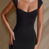 Meli Minikleid mit Herzausschnitt und Flügelärmeln in Schwarz