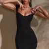 Meli Minikleid mit Herzausschnitt und Flügelärmeln in Schwarz