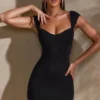 Meli Minikleid mit Herzausschnitt und Flügelärmeln in Schwarz