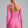 Melody verzierter Cut-Out-Unitard in Bubblegum-Pink Melody verzierter Cut-Out-Unitard in Bubblegum-Pink