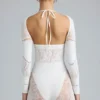 Melody Verzierter Cut-Out-Unitard in Elfenbein Melody Verzierter Cut-Out-Unitard in Elfenbein