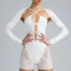 Melody Verzierter Cut-Out-Unitard in Elfenbein Melody Verzierter Cut-Out-Unitard in Elfenbein