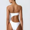 Miami Bandeau-Badeanzug mit Cut-outs und Perlenverzierung in Weiß Miami Bandeau-Badeanzug mit Cut-outs und Perlenverzierung in Weiß