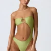 Miami Bandeau-Badeanzug mit Perlenverzierung und Cut-outs in Birnengrün Miami Bandeau-Badeanzug mit Perlenverzierung und Cut-outs in Birnengrün