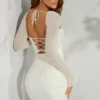 Milan Langarm-Minikleid mit Verzierungen in Elfenbein Milan Langarm-Minikleid mit Verzierungen in Elfenbein