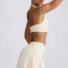Mini-Skort aus gebürstetem Jersey in Elfenbein-Mélange Mini-Skort aus gebürstetem Jersey in Elfenbein-Mélange
