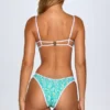 Minori Cheeky-Bikinihose in Blau mit Multicolor-Print als Unterteile Minori Cheeky-Bikinihose in Blau mit Multicolor-Print als Unterteile