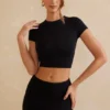 Myaree Crop-Top mit Flügelärmeln in Schwarz Myaree Crop-Top mit Flügelärmeln in Schwarz