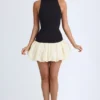 Nabila Modal-Minikleid mit Rollkragen, tiefem Taillenbund und ausgestellter Säume in Schwarz