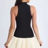 Nabila Modal-Minikleid mit Rollkragen, tiefem Taillenbund und ausgestellter Säume in Schwarz
