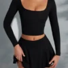 Nadiya Langarm-Crop-Top mit quadratischem Ausschnitt in Schwarz Nadiya Langarm-Crop-Top mit quadratischem Ausschnitt in Schwarz