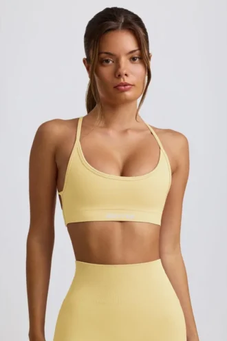 Nahtloser rückenfreier Super-Sculpt-Sport-BH in Buttergelb