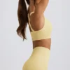Nahtloser Super Sculpt Sport-BH mit gekreuzten Trägern in Buttergelb