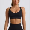 Nahtloser Super Sculpt Sport-BH mit gekreuzten Trägern in Schwarz