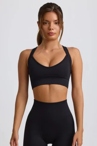 Nahtloser Super Sculpt Sport-BH mit gekreuzten Trägern in Schwarz