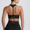 Nahtloser Super Sculpt T-Back-Sport-BH in Schwarz Nahtloser Super Sculpt T-Back-Sport-BH in Schwarz