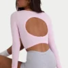 Nahtloses, weiches Rippstrick-Oberteil mit Cut-outs in Puderrosa Nahtloses, weiches Rippstrick-Oberteil mit Cut-outs in Puderrosa